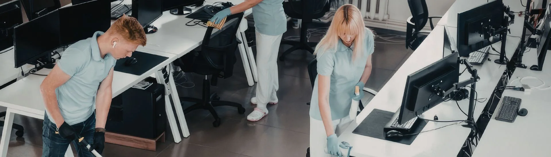 Maintenance associates working across a large open-plan commercial floor